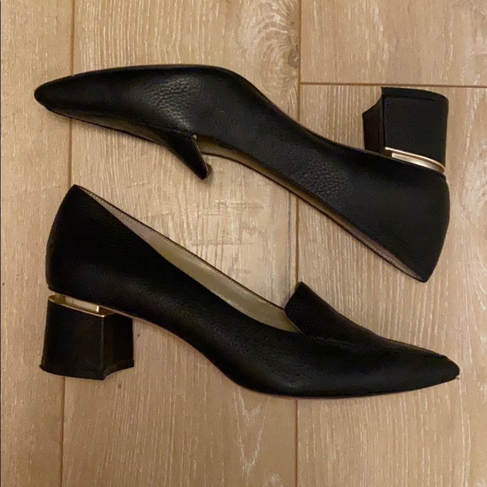 Black leather pointed toe heel gold hardware